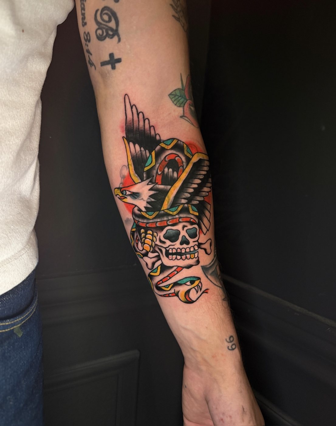 Snake and roadrunner tattoo